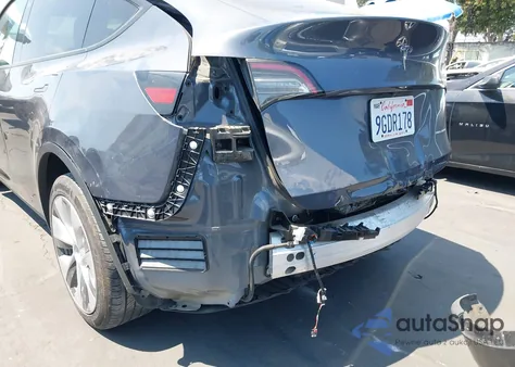 2023 Tesla Model Y Awd/Long Range Dual Motor All-Wheel Drive z USA, uszkodzony, nr VIN 7SAYGDEE7PA089135